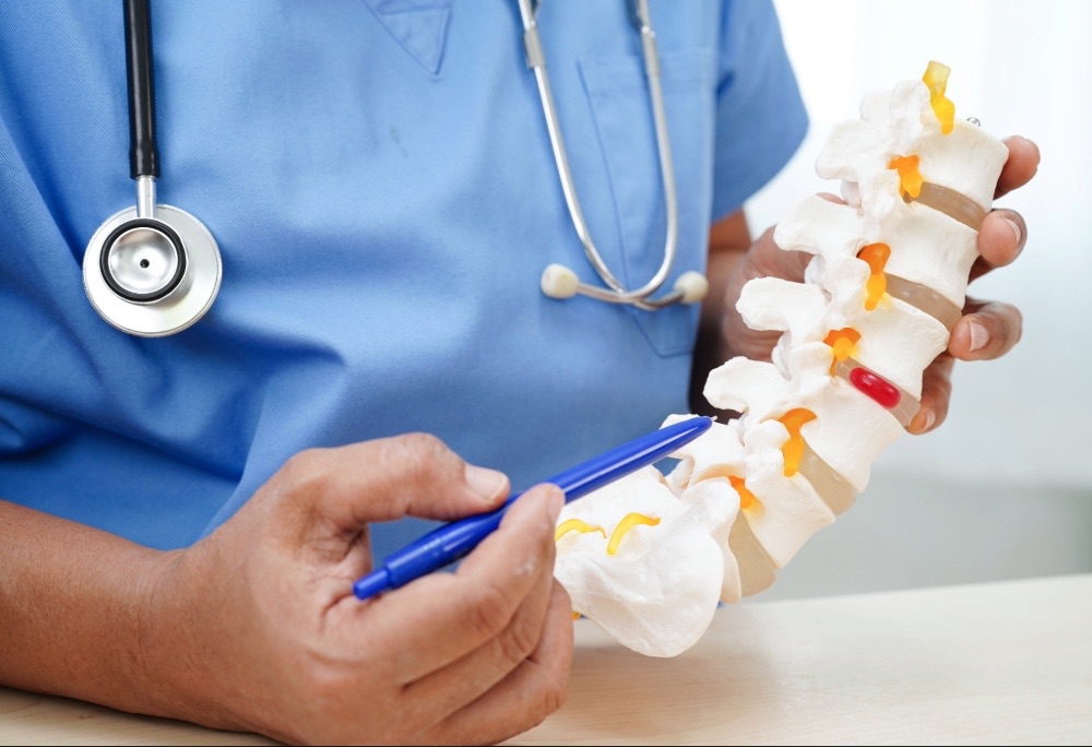 spinal fracture settlement texas